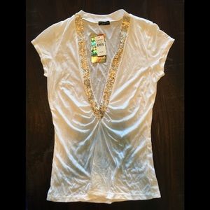 Fang. L. White shirt!